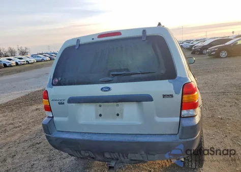 2003 Ford Escape Xlt z USA, uszkodzony, nr VIN 1FMYU93123KE19052